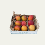 Mangos madurados en el árbol